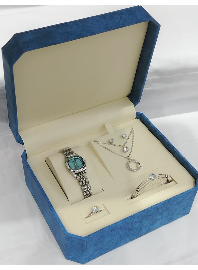 This is a women's watch set consisting of a wristwatch, bracelet, necklace, ring and earrings.